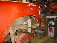  lots of clamps and lumps of steel rearranging the bent aluminium
